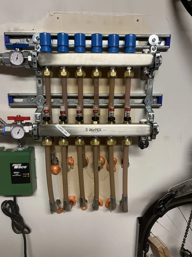 Plumber performing Gas Line Installation at a residential property in Whitehall